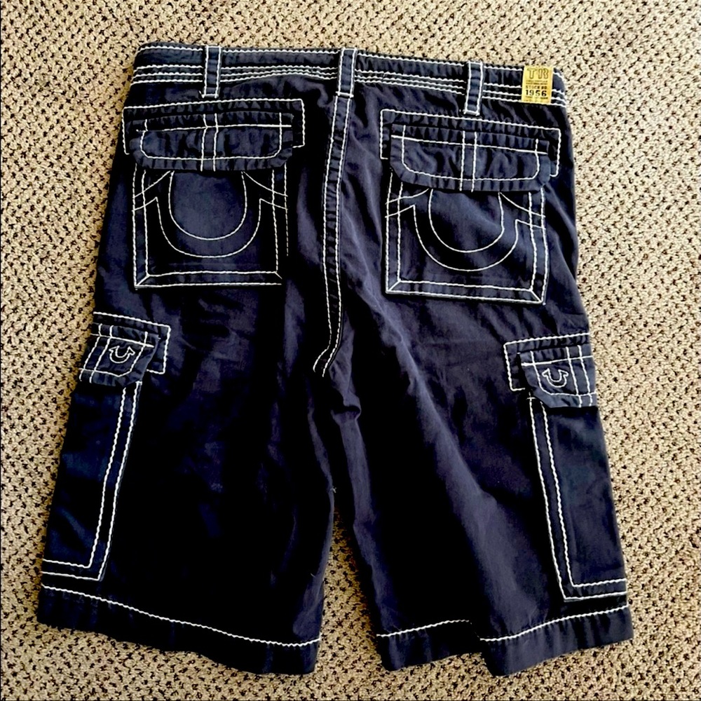 Dark grey/washed out black white stitches,